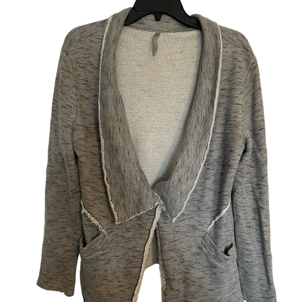 Mono B jacket with detailed collar and pockets.